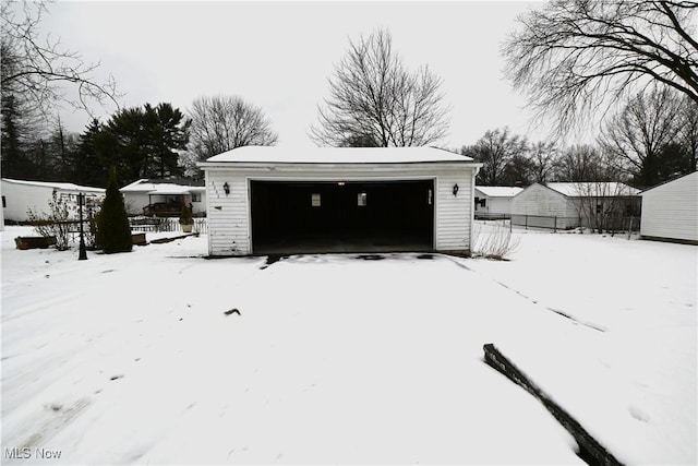 view of snow covered garage