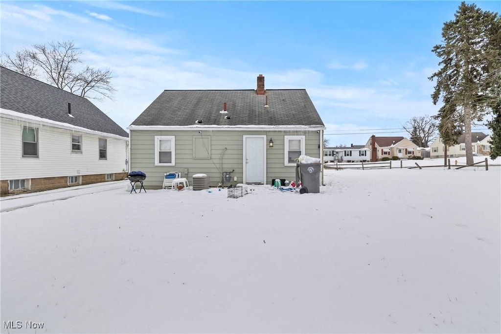 view of snow covered property