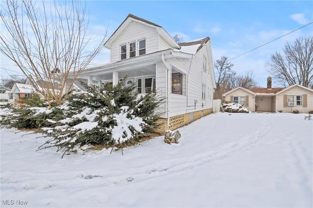 view of snow covered property