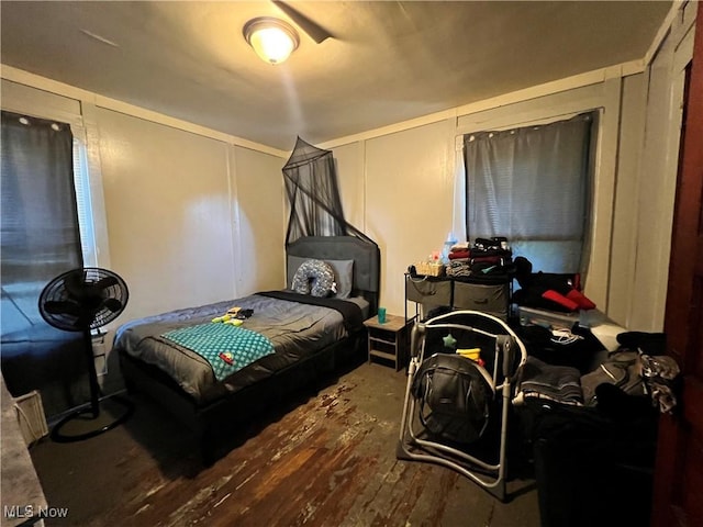 bedroom featuring hardwood / wood-style floors