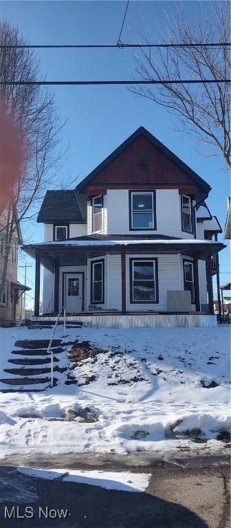 front facade featuring covered porch