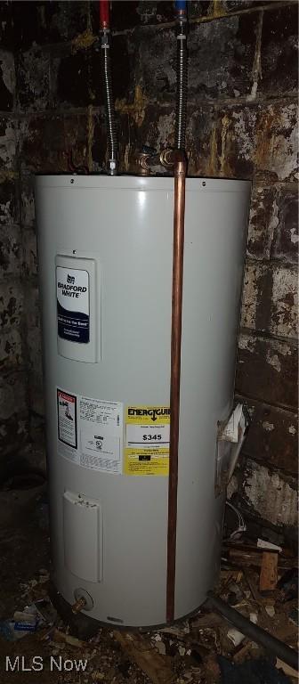 utility room featuring electric water heater