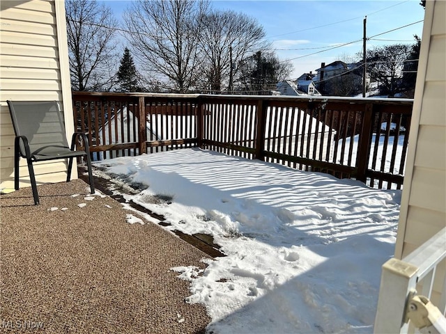 view of snow covered deck