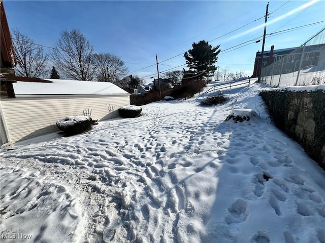 view of yard covered in snow