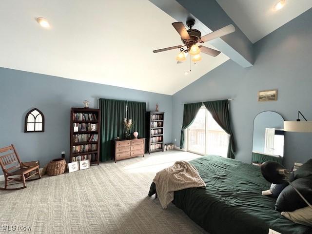 carpeted bedroom with beam ceiling, high vaulted ceiling, and ceiling fan