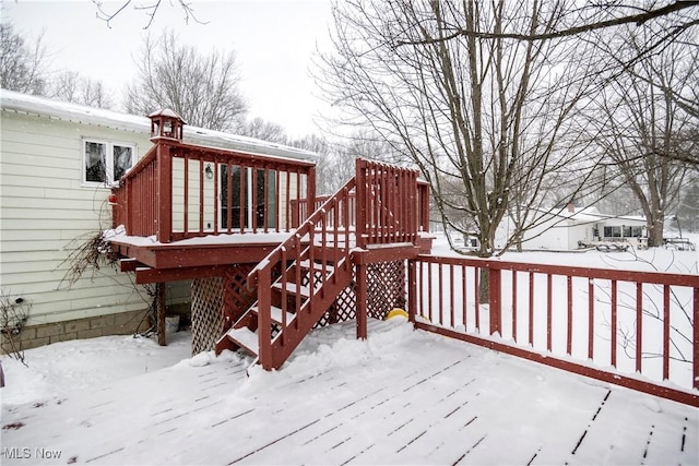 view of snow covered deck