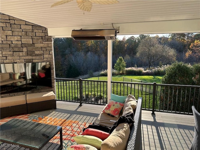 view of patio / terrace with ceiling fan and outdoor lounge area