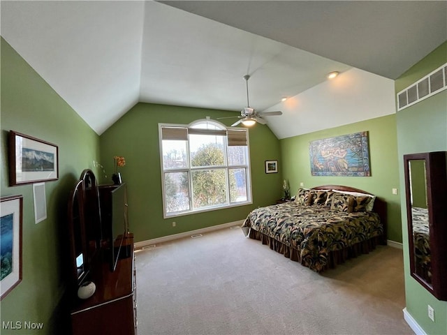 bedroom featuring ceiling fan, carpet floors, and lofted ceiling