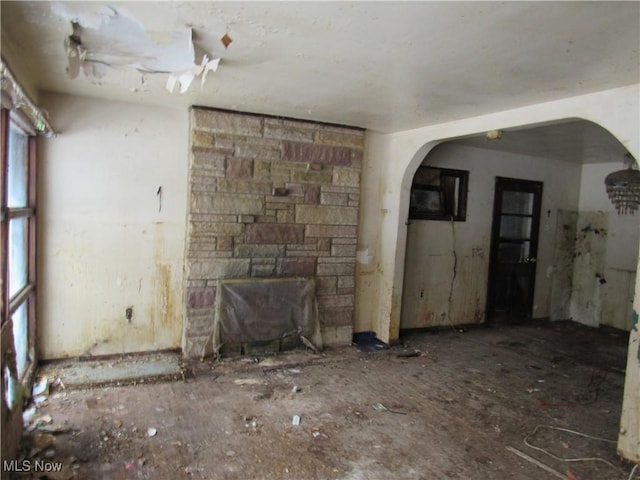 unfurnished living room with a fireplace