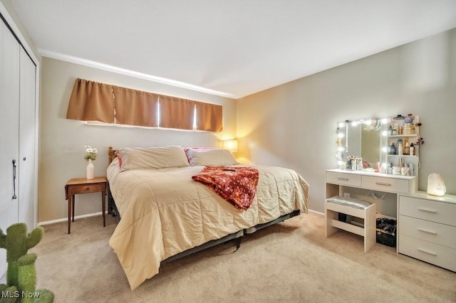 carpeted bedroom with a closet