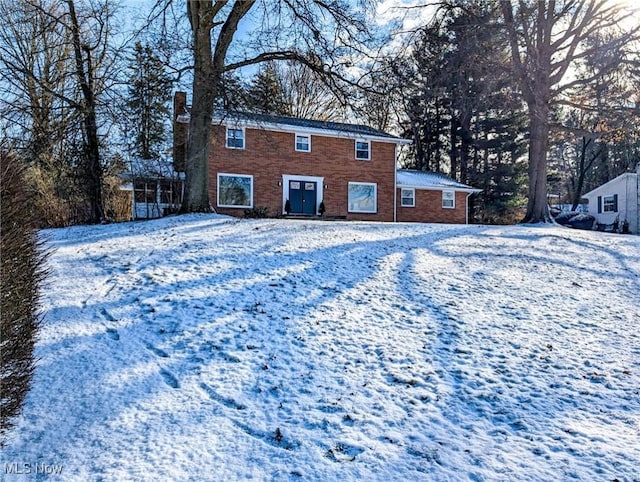 view of snow covered property