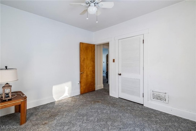 carpeted bedroom with ceiling fan and a closet