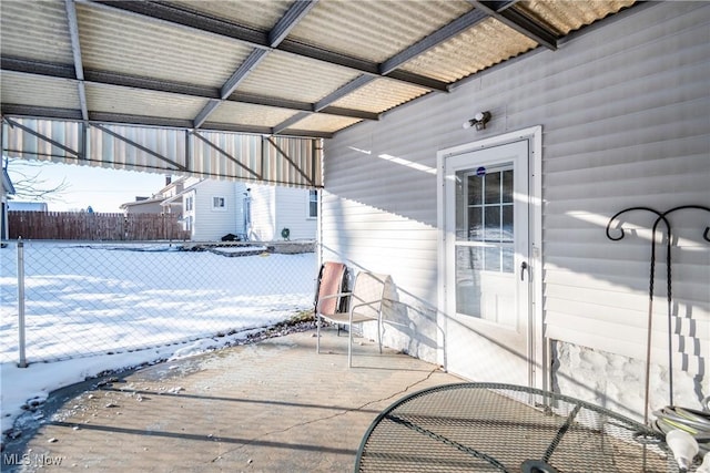 view of snow covered patio