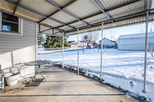 view of snow covered patio