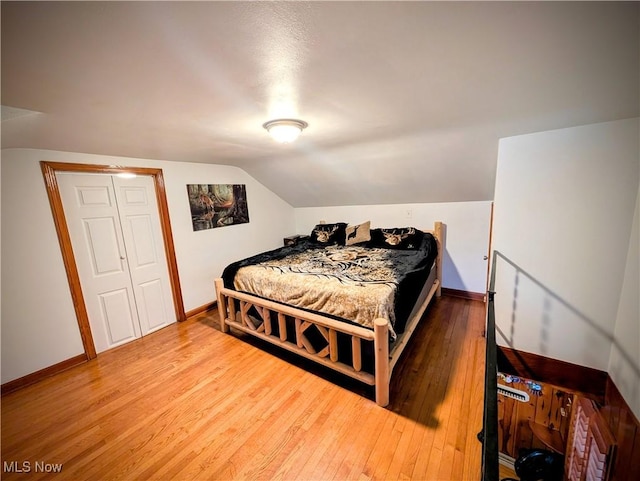 544 Maple Lake Rd, Bridgeport, WV 26330 - bedroom featuring wood-type flooring, baseboards, and lofted ceiling