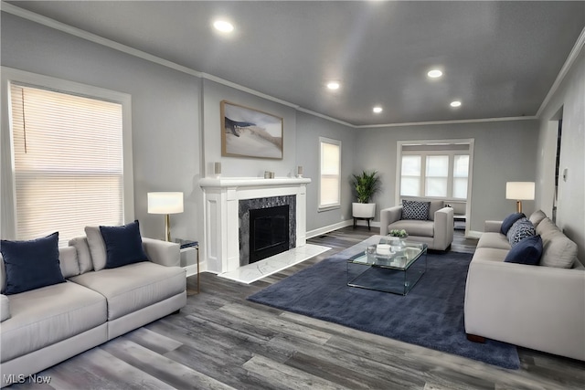 living room featuring crown molding and dark hardwood / wood-style floors