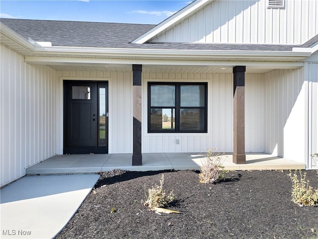 doorway to property featuring covered porch