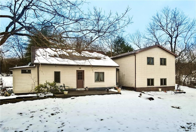 view of snow covered property