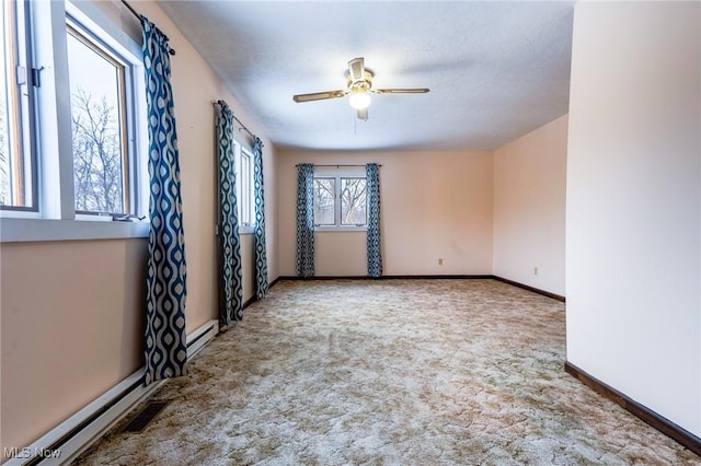 empty room with carpet and ceiling fan