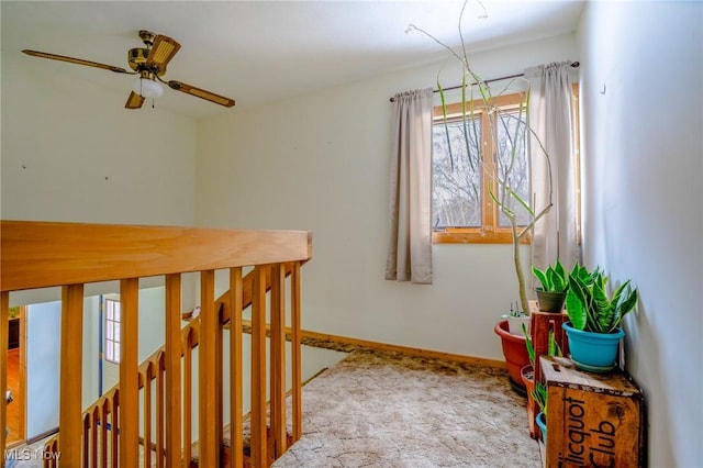 hallway featuring carpet