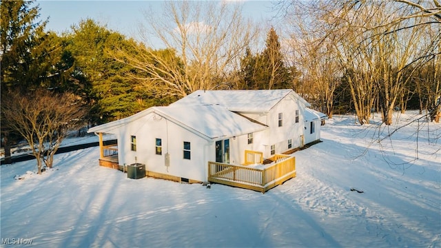 exterior space featuring central AC and a deck