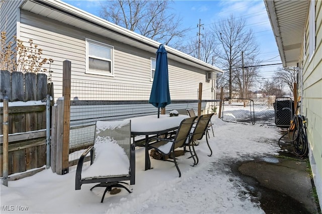 view of snow covered patio