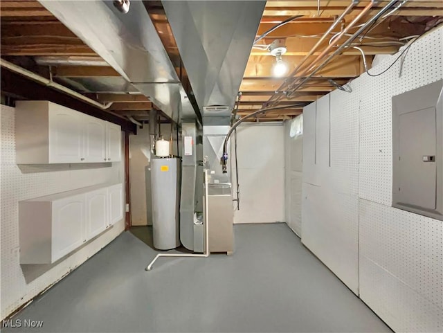 basement with water heater, electric panel, and heating unit