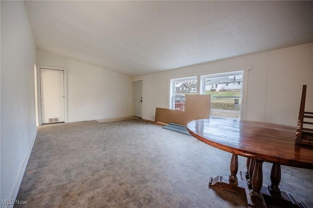 interior space featuring vaulted ceiling