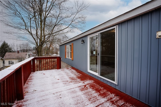 view of snow covered deck