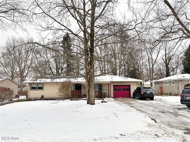 view of front of property featuring a garage