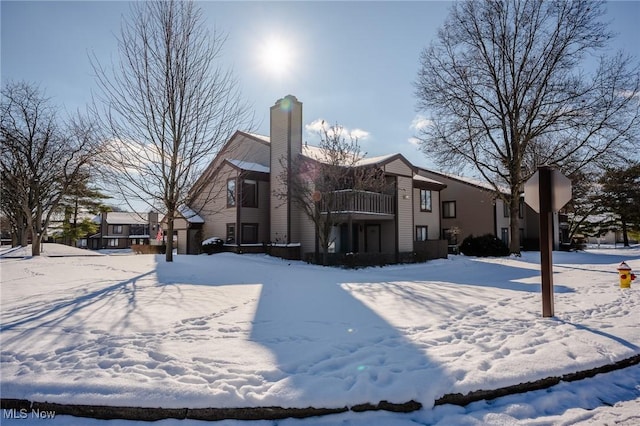 view of snow covered property