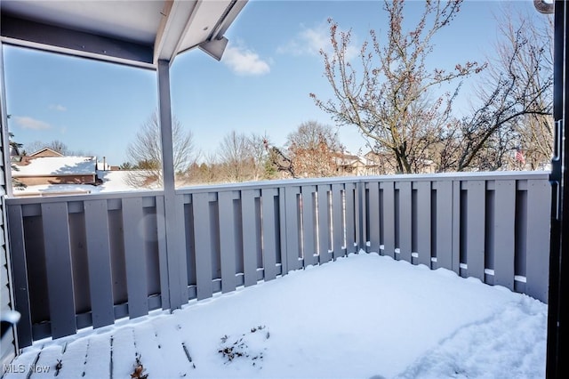 view of yard layered in snow