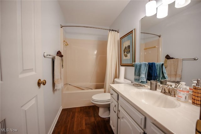 full bathroom with shower / bathtub combination with curtain, vanity, toilet, and hardwood / wood-style floors