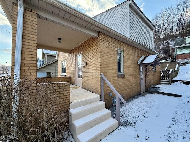 view of snow covered property