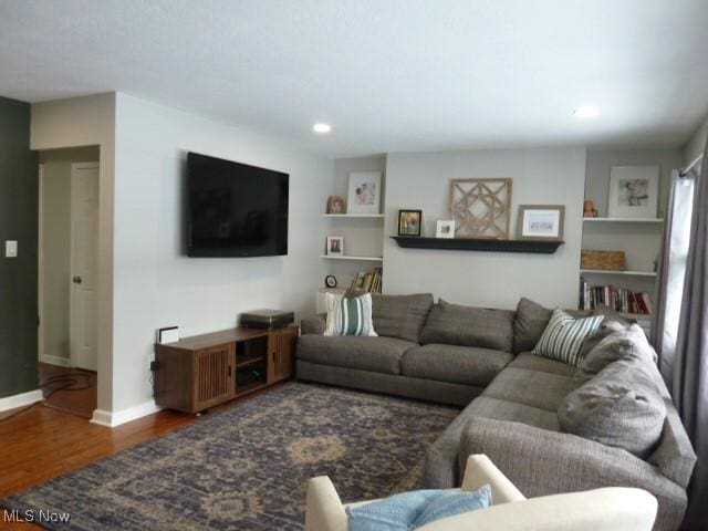 living room with hardwood / wood-style flooring