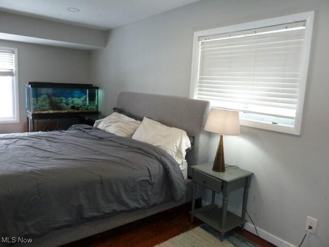 bedroom featuring hardwood / wood-style flooring