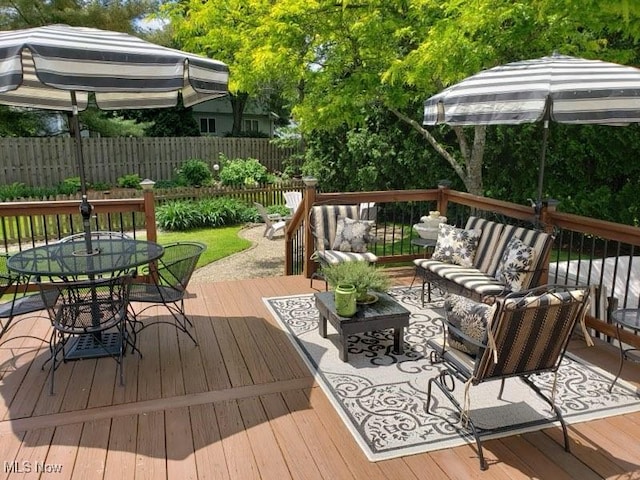 deck with an outdoor hangout area