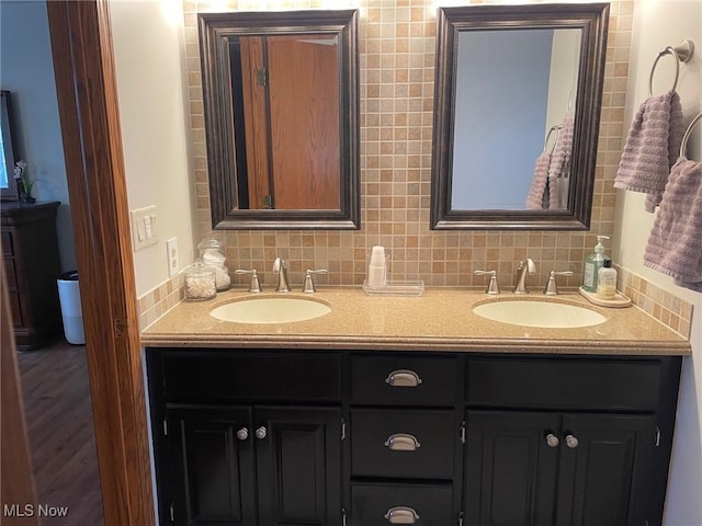 bathroom featuring vanity and wood-type flooring