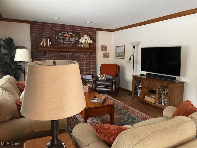 living room with ornamental molding and hardwood / wood-style floors