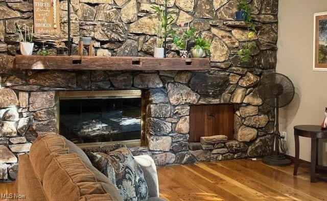 exterior details with a stone fireplace