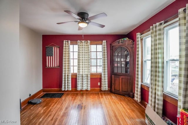 entrance foyer featuring ceiling fan and hardwood / wood-style floors