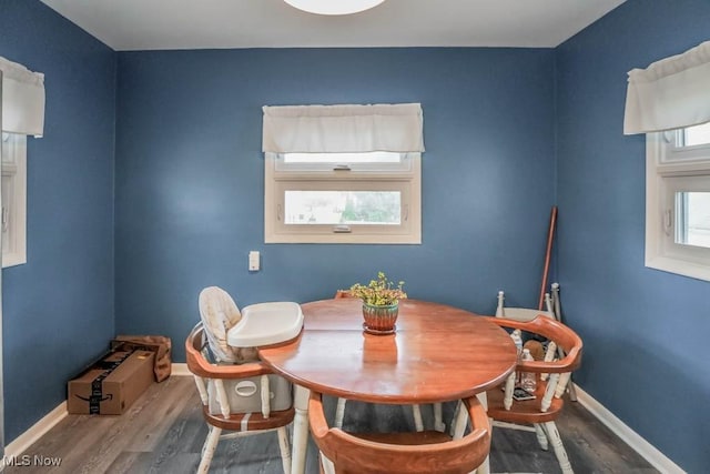 dining area with light hardwood / wood-style floors