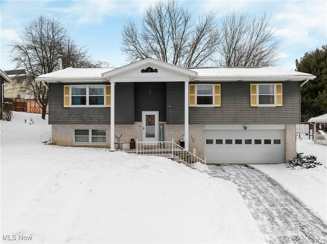 split foyer home featuring a garage