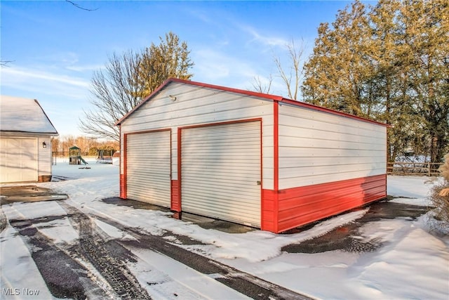 view of snow covered garage