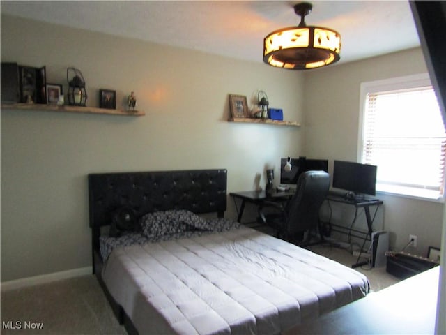 bedroom featuring carpet