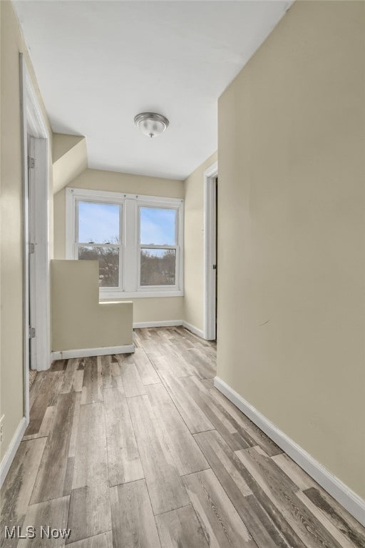 corridor featuring light hardwood / wood-style flooring