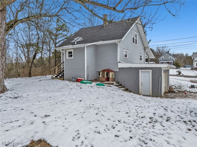 view of snow covered property