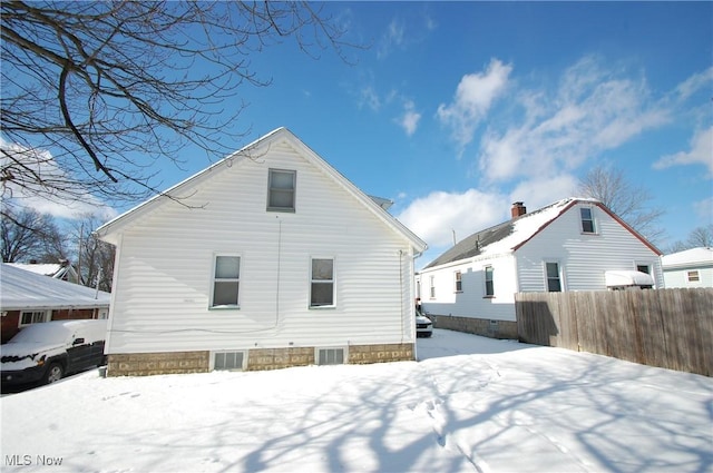 view of snow covered property