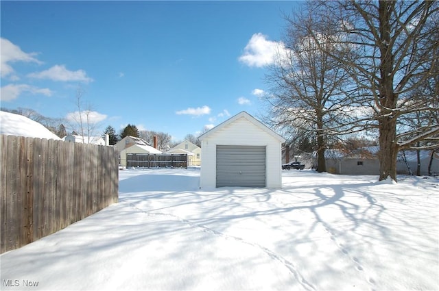 view of snow covered garage