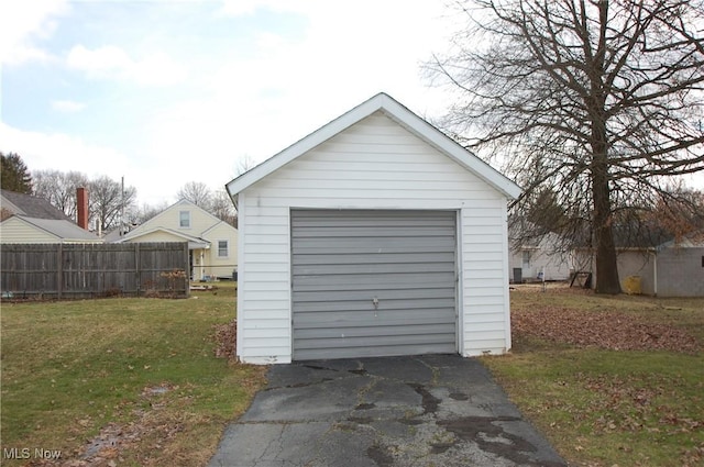 garage with a yard